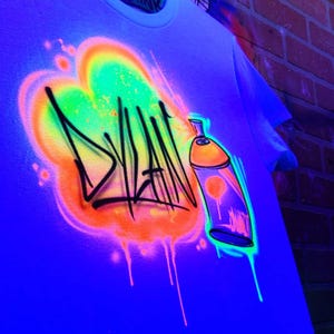 Custom Neon GLOW in the dark Spray Can Graffiti Shirt | UV / Blacklight Airbrush Tee with Personalized Name Design | Hip Hop or Rave Outfit