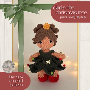 May include: A crochet doll with brown hair, a yellow star on top, and a dark green dress shaped like a Christmas tree with small red and green pom-poms. The doll wears red shoes. Text reads: clarke the christmas tree plushie - lovey bitty bub, MAEMADE, low sew crochet pattern, 2026 MAEMADE COMPANY LIMITED.