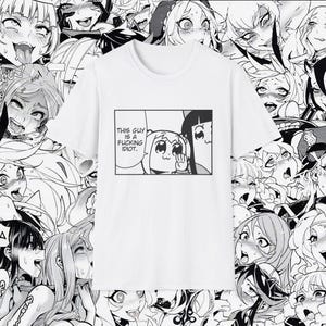 May include: White t-shirt featuring a black and white manga-style comic panel with the text "THIS GUY IS A FUCKING IDIOT." The background is filled with manga-style illustrations of various characters.
