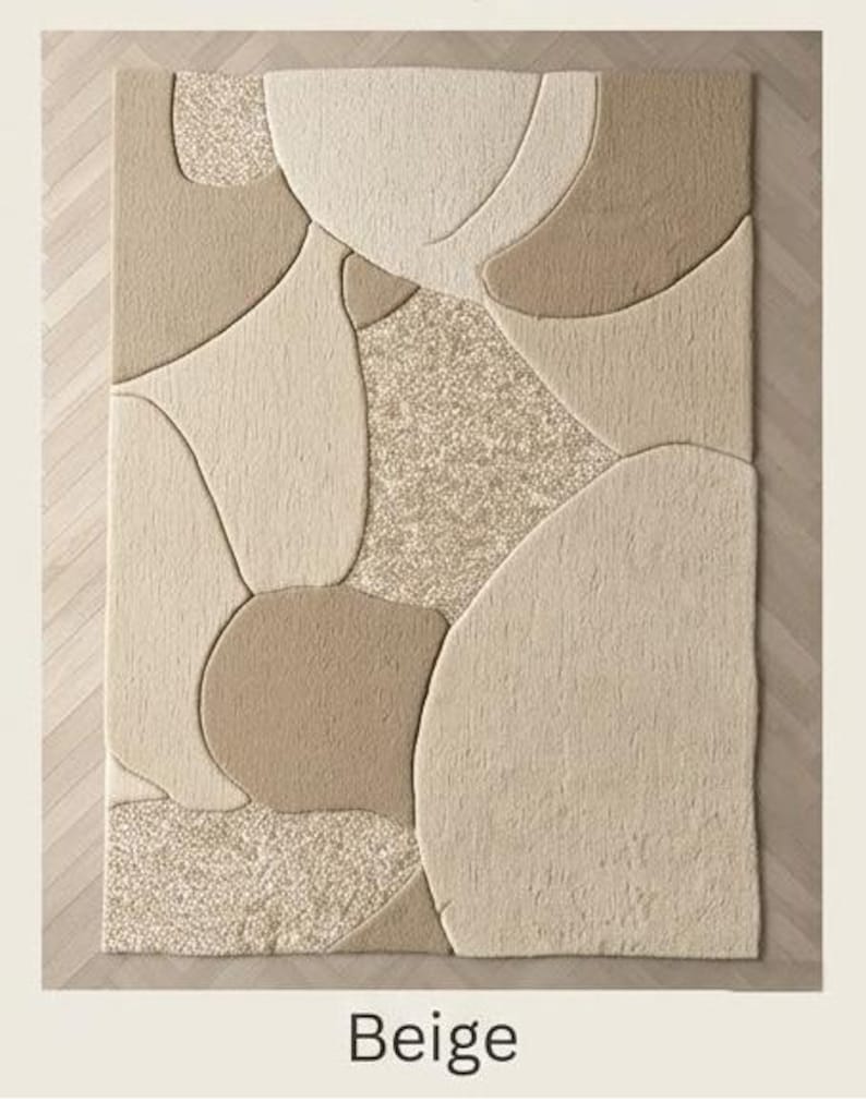 May include: Beige area rug with an abstract design. The rug features a pattern of overlapping shapes in varying shades of beige and tan. The rug has a textured surface and the word "Beige" is printed at the bottom.