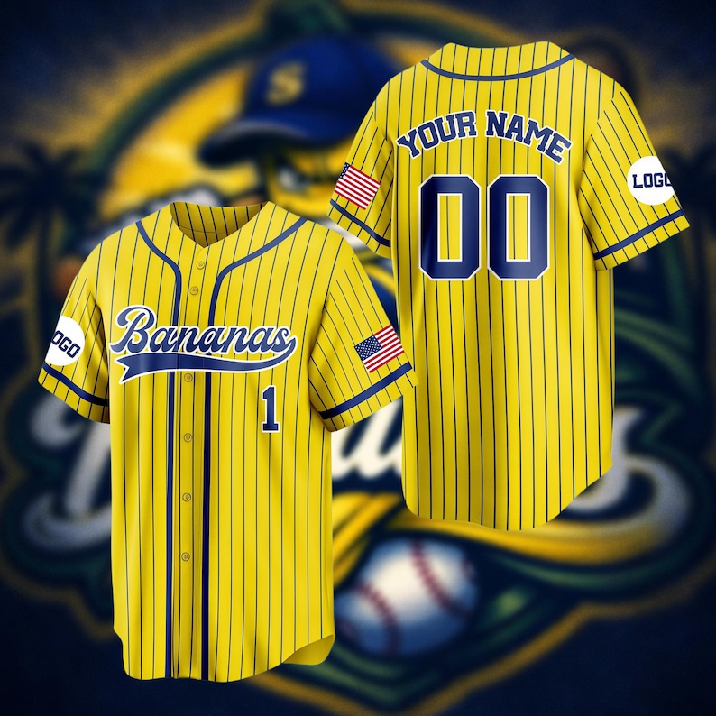 May include: A yellow baseball jersey with thin dark blue pinstripes. The front features the text Bananas in blue script, the number 1, and a US flag patch. The back displays the text YOUR NAME, the number 00, a US flag patch, and logo circles.