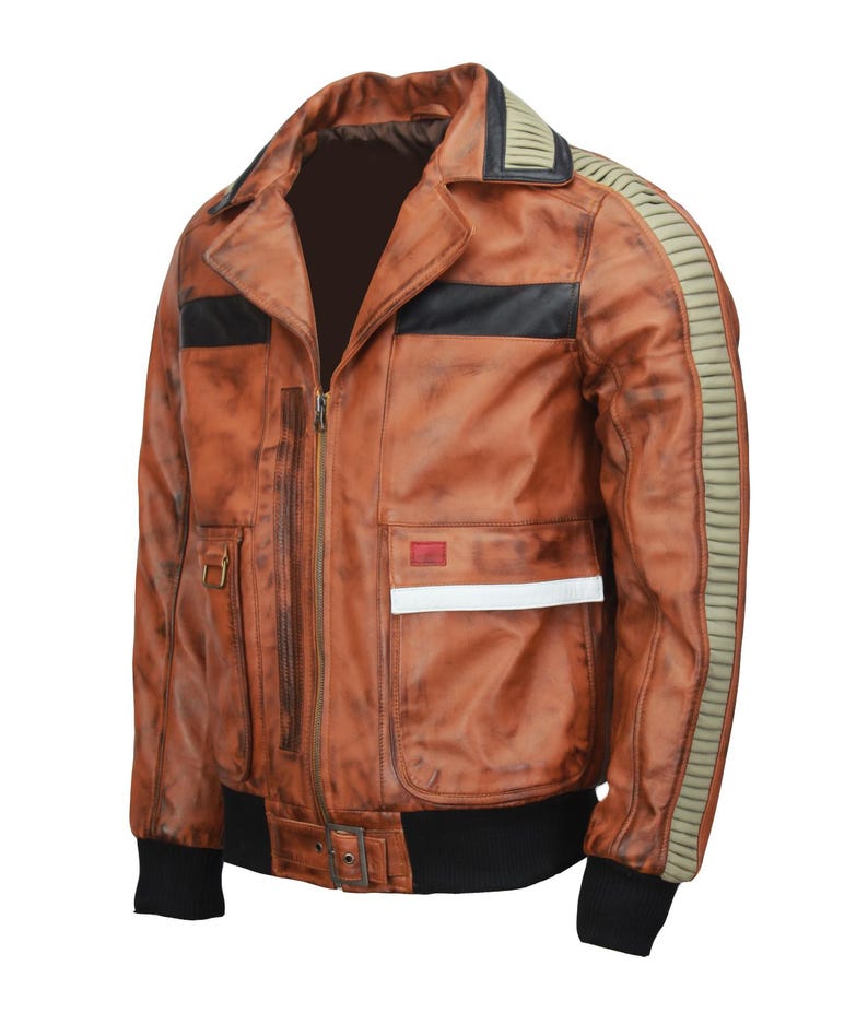 May include: Brown leather jacket with a distressed finish. Features include a zip closure, black accents, and a ribbed design on the sleeves. The jacket has two front pockets and a black ribbed hem and cuffs.
