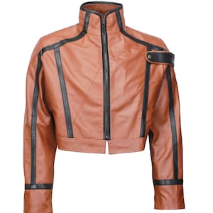 May include: A brown leather jacket with black accents. The jacket features a high collar, a full-length zipper, and black stripes down the sleeves and sides. A black accent is on the shoulder. The jacket is a cropped style.