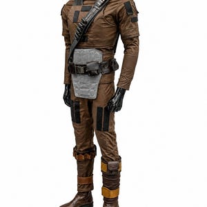 May include: A brown costume with a high collar, shoulder strap, and utility belt. The outfit includes a long-sleeved top, trousers, and boots. The costume has black accents and a grey chest plate. The boots are brown leather.