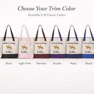 A collection of eight canvas tote bags with different trim colors: natural, black, light pink, maroon, purple, navy, royal, and red. Each bag features a gold equestrian design and the name "Willow". The text "Choose Your Trim Color" is at the top.