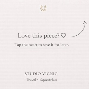 A light beige graphic with the text "Love this piece?" and "Tap the heart to save it for later." A horseshoe graphic is at the top. The Studio Vicnic logo is at the bottom, with "Travel • Equestrian".