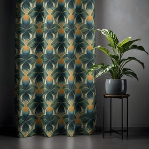 May include: A patterned curtain featuring a repeating floral design in teal, green, and orange hues. The curtain is displayed against a grey wall, with a potted plant on a small table to the right.