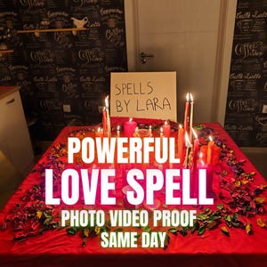 May include: A red table is set with candles and flowers, with the text "POWERFUL LOVE SPELL" in large white letters. The sign says "SPELLS BY LARA" and "PHOTO VIDEO PROOF SAME DAY".