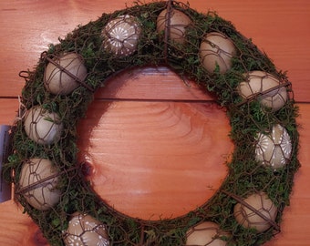 12 inch Real Chicken Egg Wreath with 3 Olive egger Chicken eggs decorated with the Drop Pull waxing method.