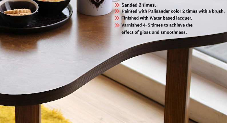 Birch plywood coffee tables set styled in contemporary living room interior