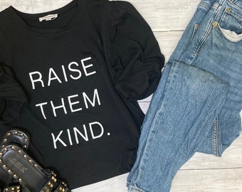 Raise Them Kind stretch jersey fit short sleeve crewneck comfort fit puff sleeve powerful meaningful statement tee for her teacher gifts