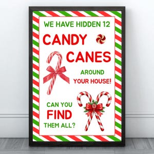 Puede incluir: Un letrero navideño enmarcado con un borde a rayas rojas y blancas. El letrero dice: "¡HEMOS ESCONDIDO 12 BASTONES DE CARAMELO ALREDEDOR DE TU CASA! ¿PUEDES ENCONTRARLOS TODOS?" Se presentan ilustraciones de bastones de caramelo.