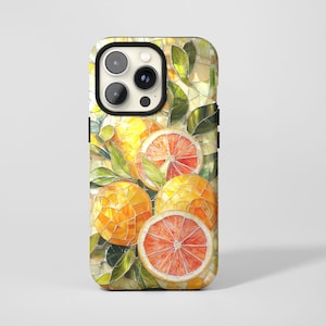 May include: A phone case featuring a stained-glass style design of oranges and leaves. The oranges are a mix of yellow and orange, with some sliced to reveal the red interior. Green leaves and a mosaic background complete the design.