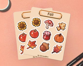 May include: Two sticker sheets with pixelated fall-themed illustrations, including a sunflower, apple, mushroom, pumpkin, and leaves. The word "Fall" is at the top of the sheet. The artist's name is at the bottom.