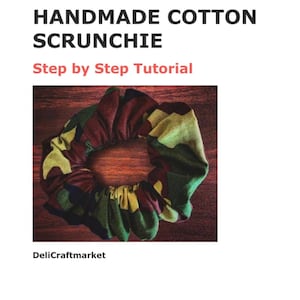May include: Handmade cotton scrunchie in a camouflage pattern with green, brown, and yellow hues. The scrunchie is circular and appears to be made of fabric. Text on the image reads "Step by Step Tutorial".