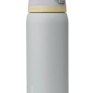 May include: A light blue water bottle with a white and gray lid and a yellow band. The bottle has the word "owala" printed on it. The bottle is cylindrical and appears to be made of plastic.