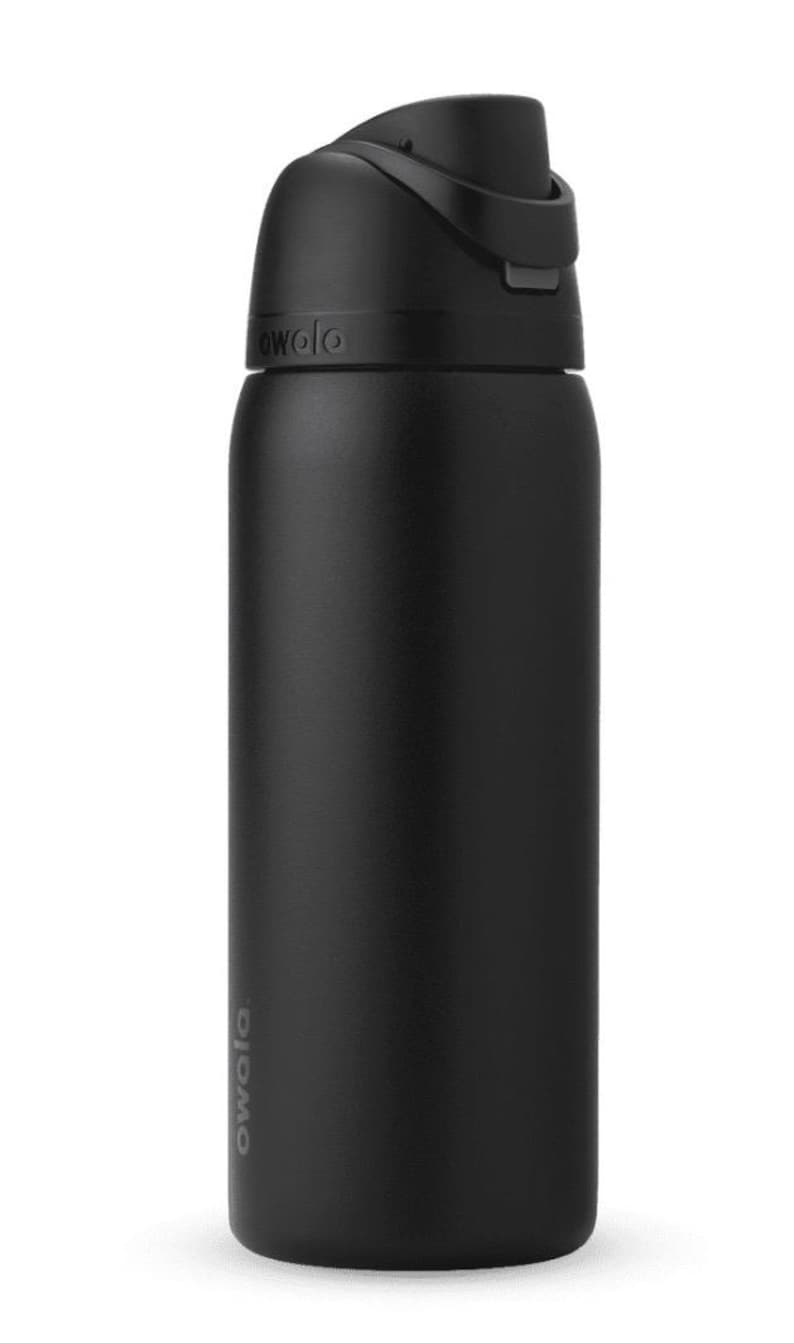 May include: A black Owala insulated water bottle with a flip-top lid. The bottle has a sleek, cylindrical design and features the Owala logo on the side. The lid has a built-in handle for easy carrying.