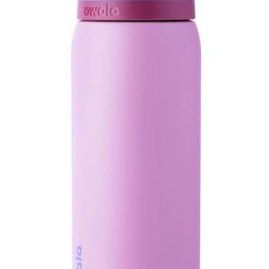 May include: A lavender-colored Owala water bottle with a multi-colored lid. The lid features a blue top, a peach-colored hinge, and a red spout. The Owala logo is printed on the bottle and lid.