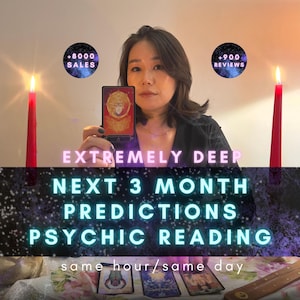 May include: A tarot card held upright featuring a red and gold design, flanked by two lit red candles. Text overlays include +8000 SALES, +900 REVIEWS, EXTREMELY DEEP NEXT 3 MONTH PREDICTIONS PSYCHIC READING, and same hour/same day, with three cards laid out below.