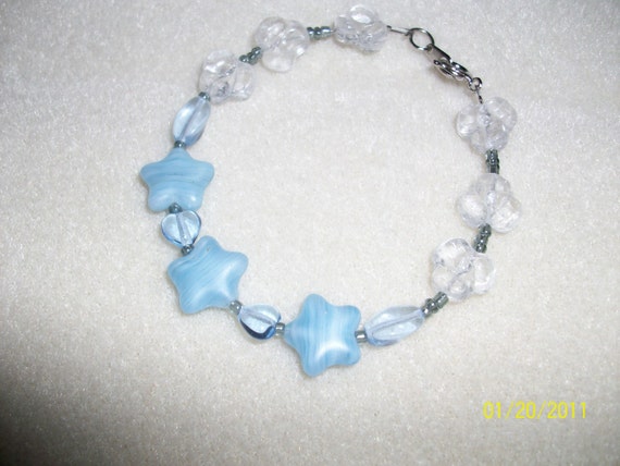 Items similar to Child's Floral Stars and Hearts Bracelet on Etsy