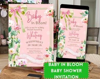 May include: Pink baby shower invitation with floral and cactus illustrations. The invitation reads "Baby In Bloom!" and includes the name "Whitney" and event details. A phone displays the same design.