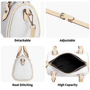 May include: White and beige handbag with a cylindrical shape. Features include a detachable strap, adjustable length, neat stitching, and high capacity. The bag has a gold zipper and hardware.