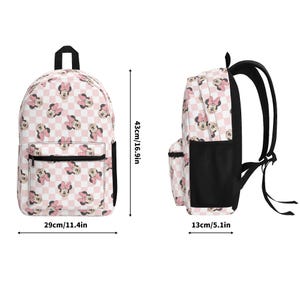 Peut inclure: Un sac &agrave; dos &agrave; carreaux rose clair et blanc avec un motif r&eacute;p&eacute;titif de Minnie Mouse. Le sac &agrave; dos mesure 43 cm de hauteur, 29 cm de largeur et 13 cm de profondeur, avec des fermetures &eacute;clair noires, des poches lat&eacute;rales et des bretelles r&eacute;glables.