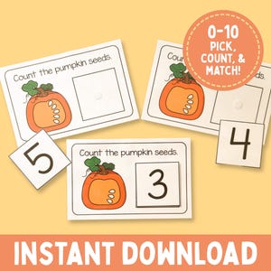 May include: Educational activity cards featuring orange pumpkins with green stems and white seeds. The cards include the text Count the pumpkin seeds and a circular badge with the text 0-10 PICK, COUNT, & MATCH! Includes separate square number tiles.