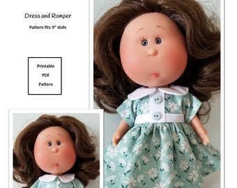May include: Printable PDF pattern for a dress and romper for 9-inch dolls. The pattern is shown on a doll wearing a green and white floral dress and a green and white gingham romper.
