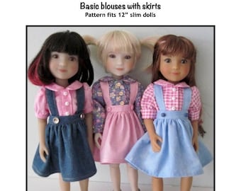May include: Three 12-inch slim dolls wearing different outfits. The doll on the left is wearing a blue denim skirt with a pink and white gingham blouse. The doll in the middle is wearing a pink skirt with a floral print blouse. The doll on the right is wearing a light blue skirt with a pink and white gingham blouse. The dolls are all wearing black shoes.