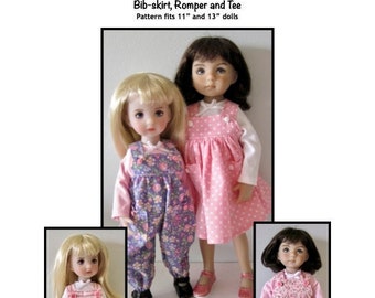 May include: Three dolls wearing different outfits: a pink and white bib-skirt, a purple and white romper, and a pink and white romper. The dolls are 11 inches and 13 inches tall. The image includes the text "Bib-skirt, Romper and Tee" and "Pattern fits 11" and 13" dolls".
