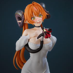May include: A figurine of a female anime character with orange hair, green eyes, and small horns. She wears a white dress and a black choker. The character is holding a red and black object.