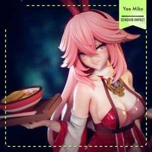 May include: A detailed figurine of Yae Miko from Genshin Impact. The figure has pink hair and is wearing a red and white outfit. She is holding a tray with a bowl of food. The text "Yae Miko" and "Genshin Impact" are visible.