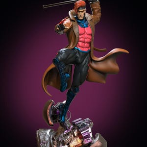May include: A collectible statue of a character with reddish-brown hair, wearing a long brown trench coat over a pink chest piece and black pants. The figure holds a long staff above its head and stands on a base of metallic debris.