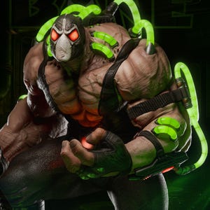 May include: A detailed 1:6 scale figure of Bane, a DC Comics villain. The figure features a mask, tubes, and muscular physique. The figure is predominantly brown, black, and green, with glowing red eyes and accents. The text "AVAILABLE ON PATREON" is visible.