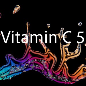 May include: Abstract image with the text "Vitamin C 5" in white against a black background. The image features colorful, organic shapes in shades of blue, purple, orange, and yellow, resembling microscopic structures.