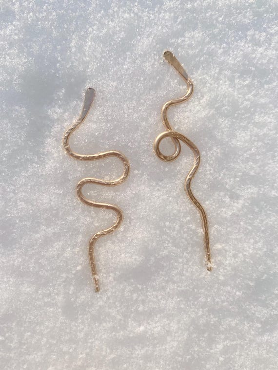 snake studs