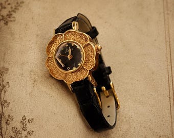 Vintage women's gold dial watch with leather strap | Elegant retro floral jewelry | Timeless and durable gift watch | Chic boho watch