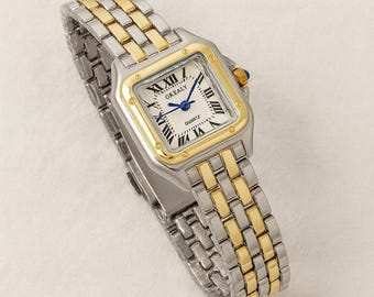 Two-tone silver & gold unisex watch – Luxury style, Roman numeral dial, precise quartz movement, elegant bracelet – Refined gift idea