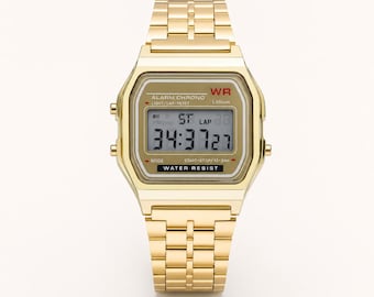 Minimalist retro digital watch in vintage style with gold and silver strap
