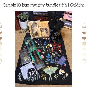 May include: A collection of mystical items, including a black tumbler with a straw, a wand, a book, and a patch with a pentagram. The items are arranged on a black cloth with a botanical design, including a moth and mushrooms. The text "Sample 10 Item mystery bundle with 1 Golden:" is at the top.