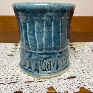Art Pottery Tumbler or Container Dented Design Blue Glaze Studio Mark EB.                   11/8
