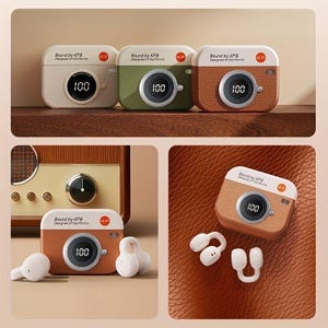 May include: Three wireless earbuds cases shaped like vintage cameras, in cream, olive green, and brown. Each case displays "100" and the text "Sound by KFG Designed of California". The image also shows the earbuds.