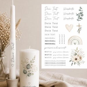 Könnte beinhalten: Eine lange weiße Stabkerze mit dem Text Dein Text und einem Herzsymbol sowie eine weiße Stumpenkerze mit botanischer Illustration und dem Text individualisierbar. Ein digitales Blatt zeigt verschiedene Textoptionen, Herzen, Kreuze, Regenbögen und Blumenmotive.