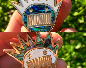 Gold leif wood boognish pin with abalone and pearl inlay