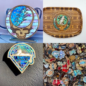May include: A collection of four wooden inlay designs featuring a Grateful Dead inspired skull and lightning bolt motif. The designs are made with abalone shell and wood and are available in various sizes and shapes.