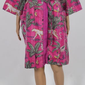 May include: A rustic wooden sign with the text "Welcome to our home" in white lettering. The sign has a distressed finish and a simple, inviting design, ideal for entryway decor.