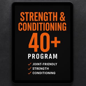以下が含まれることがあります： 黒いタブレットには、オレンジ色の文字で「STRENGTH & CONDITIONING」と表示され、大きなオレンジ色の数字で「40+」と表示されています。その下に「PROGRAM」という言葉が白で表示されています。「JOINT-FRIENDLY」、「STRENGTH」、「CONDITIONING」という言葉の前にチェックマークが付いています。