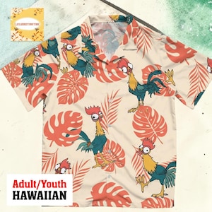 May include: A beige Hawaiian shirt featuring a repeating pattern of cartoon roosters and large orange leaves. The shirt has short sleeves and a button-down front. The text "Adult/Youth HAWAIIAN" is visible.