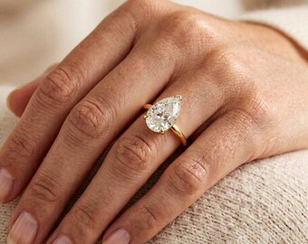 Bague solitaire en argent sterling 925, ornée d'un diamant taille poire de 3 carats (qualité 6A), serti d'un halo caché. Cadeau idéal pour un mariage ou pour son 15e anniversaire.